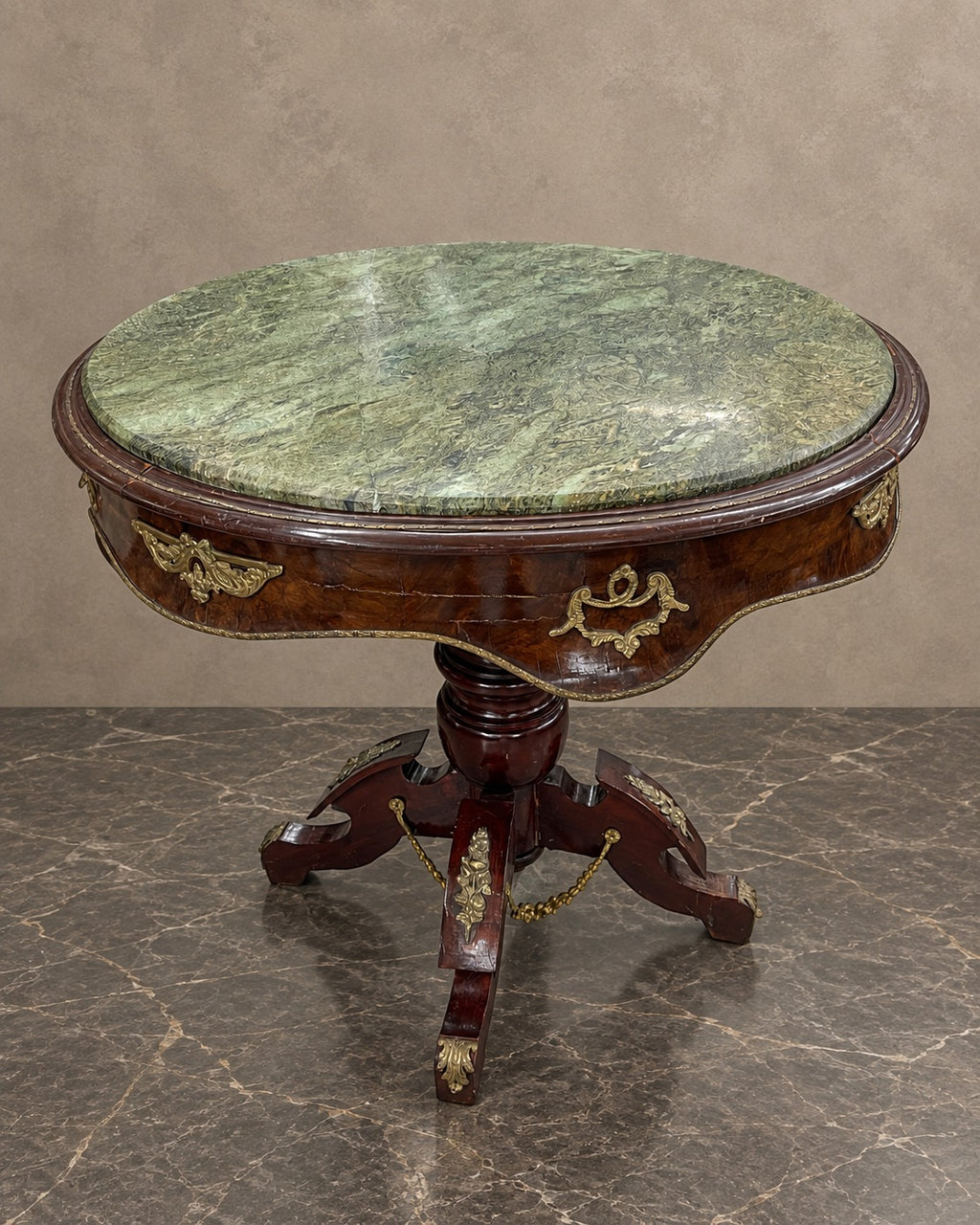 Bronze-Mounted Table with Green Marble Top in a styled setting