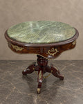 Bronze-Mounted Table with Green Marble Top in a styled setting