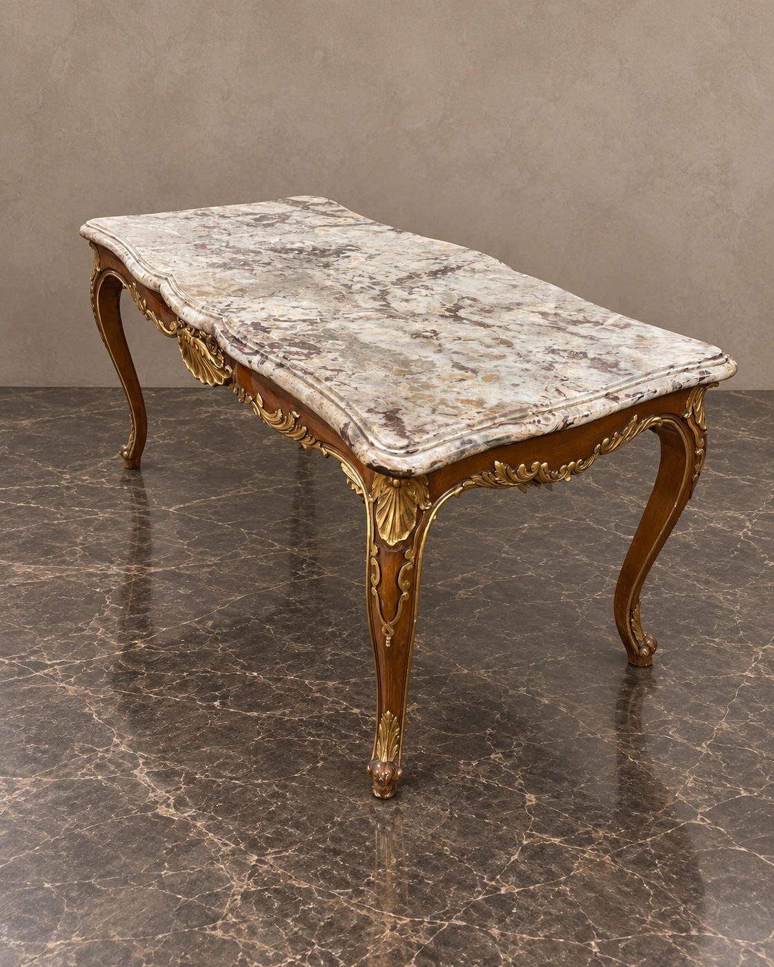 Gilt-Decorated Marble-Top Coffee Table in a styled setting