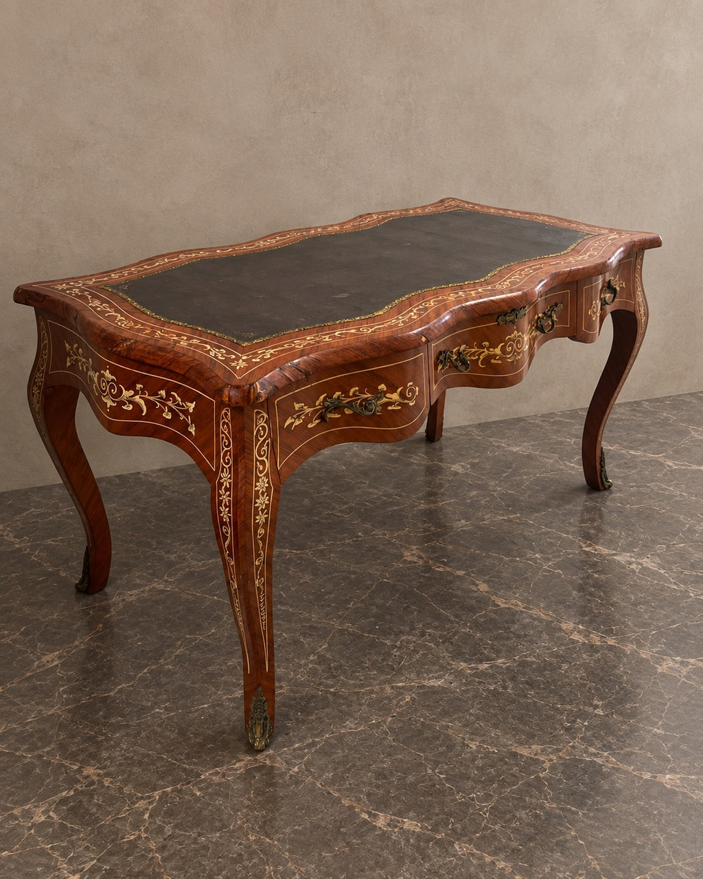 Serpentine Marquetry Writing Desk with Leather Top in a styled setting