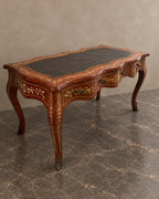 Serpentine Marquetry Writing Desk with Leather Top in a styled setting