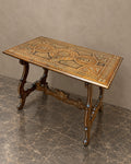 Inlaid Trestle Table with Shaped Supports in a styled setting