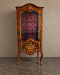 Floral Marquetry Display Cabinet with Buttoned Lining in a styled setting