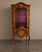 Floral Marquetry Display Cabinet with Buttoned Lining in a styled setting
