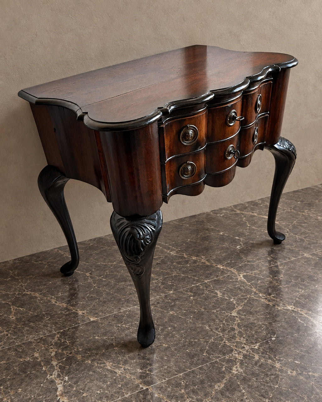 Dutch Serpentine Two-Drawer Cabinet in a styled setting