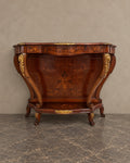 Romantic Scene Marquetry Console in a styled setting