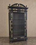 Renaissance-Style Ebonised Display Cabinet in a styled setting