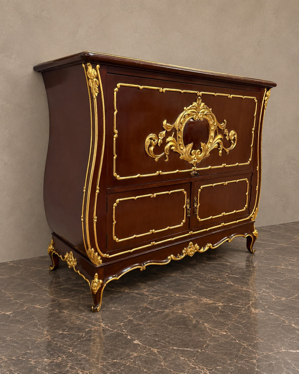French Gilt-Decorated Three-Door Cabinet in a styled setting