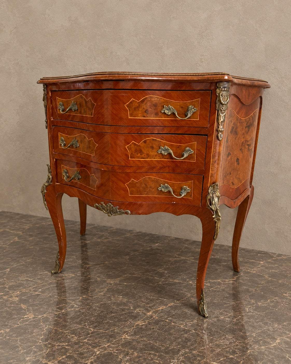 French-Style Marquetry Chest on Cabriole Legs in a styled setting