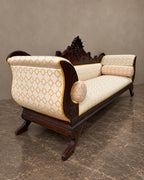 Carved Mahogany Sofa with Geometric Upholstery in a styled setting