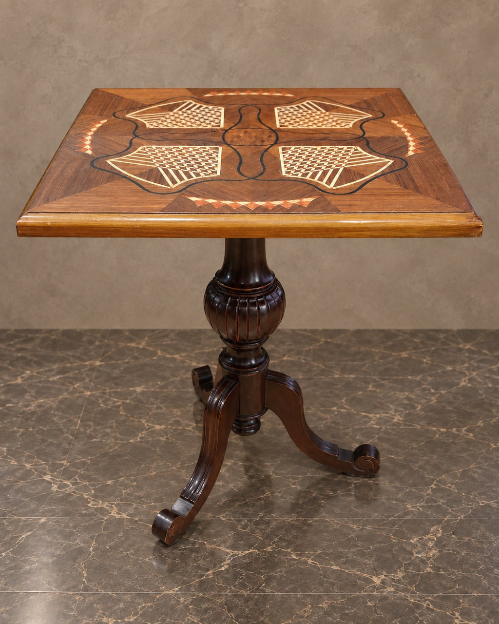 Square Geometric Marquetry Pedestal Table in a styled setting
