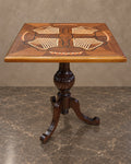 Square Geometric Marquetry Pedestal Table in a styled setting