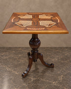 Square Geometric Marquetry Pedestal Table in a styled setting
