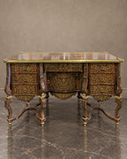 Ornate Metal-Inlaid Writing Desk in a styled setting