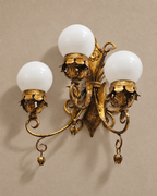 Gilt Wrought-Iron Wall Sconce with Three Opaline Globes — main view