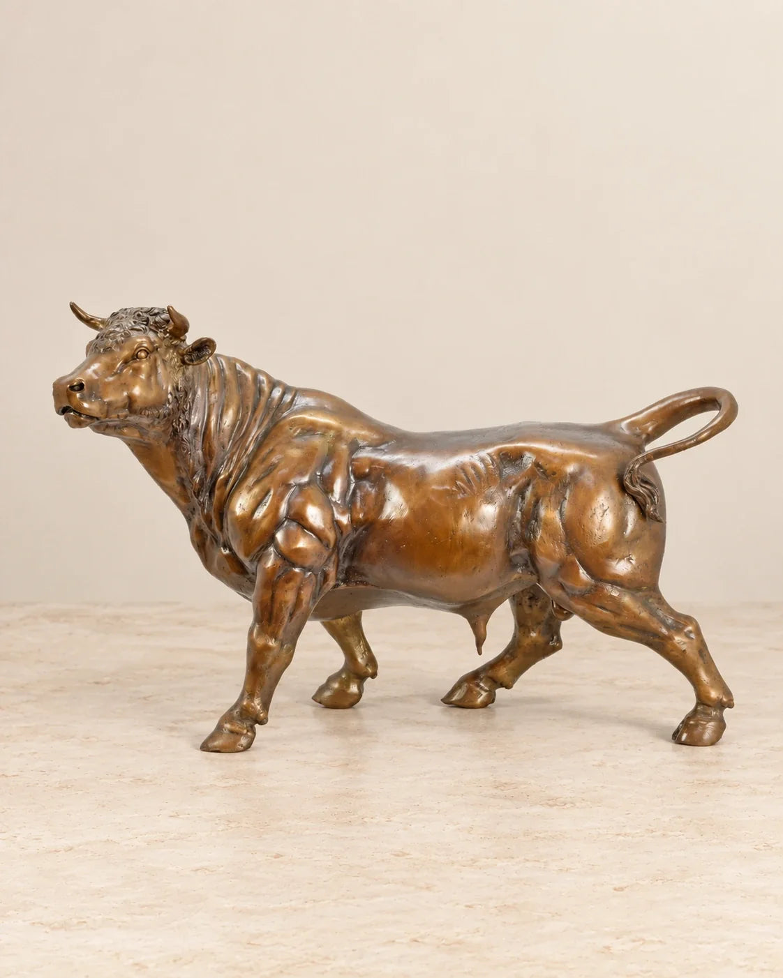 Bull Bronze Sculpture — primary view against a warm ivory background