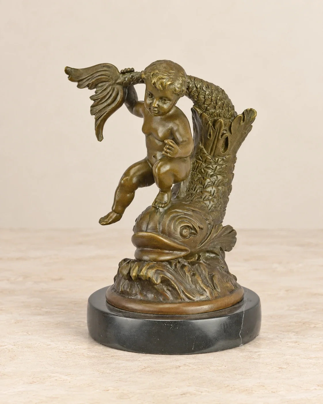 Cherub with Fish Bronze Sculpture — front view