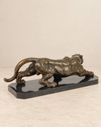 Crouching Panther Bronze Sculpture — second view against a warm ivory background