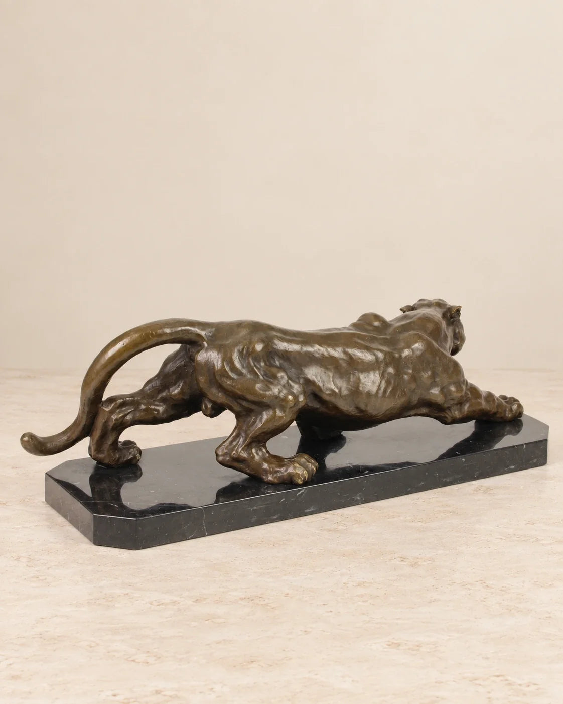 Crouching Panther Bronze Sculpture — second view against a warm ivory background
