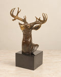 Deer Head Bronze Sculpture — primary view against a warm ivory background