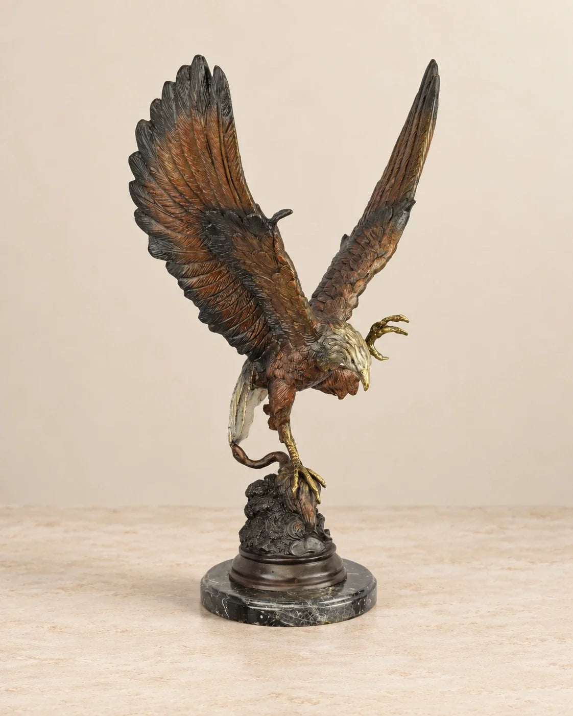 Eagle Catching Prey Bronze Sculpture — primary view against a warm ivory background