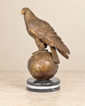 Eagle on a Globe Bronze Sculpture — primary view against a warm ivory background