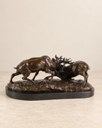 Fighting Stags Bronze Sculpture — second view against a warm ivory background