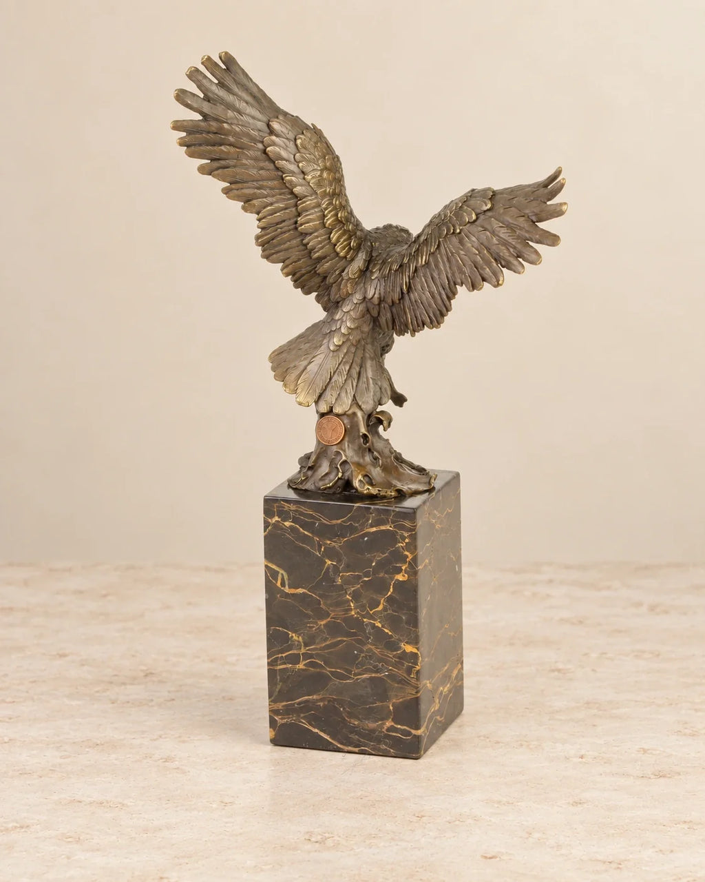 Fishing Eagle Bronze Sculpture — second view against a warm ivory background