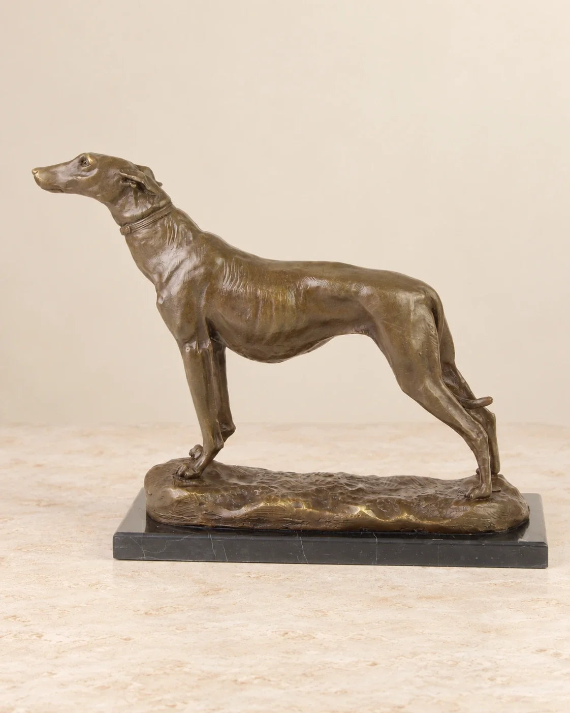 Greyhound Bronze Sculpture — 24.5 cm Tall — second view against a warm ivory background