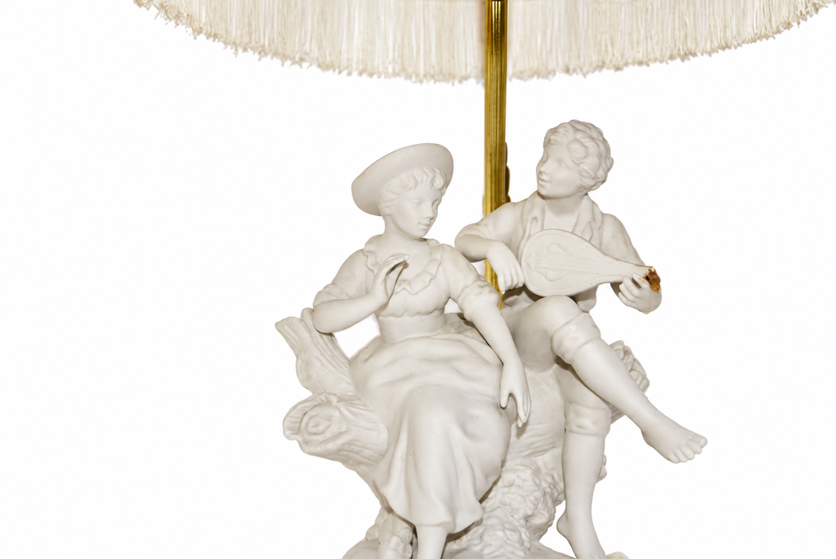 Biscuit Porcelain Musician Lamp with Pleated Fringed Shade — detail on white background