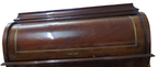 Original detail of the closed cylinder lid, marquetry and surface wear