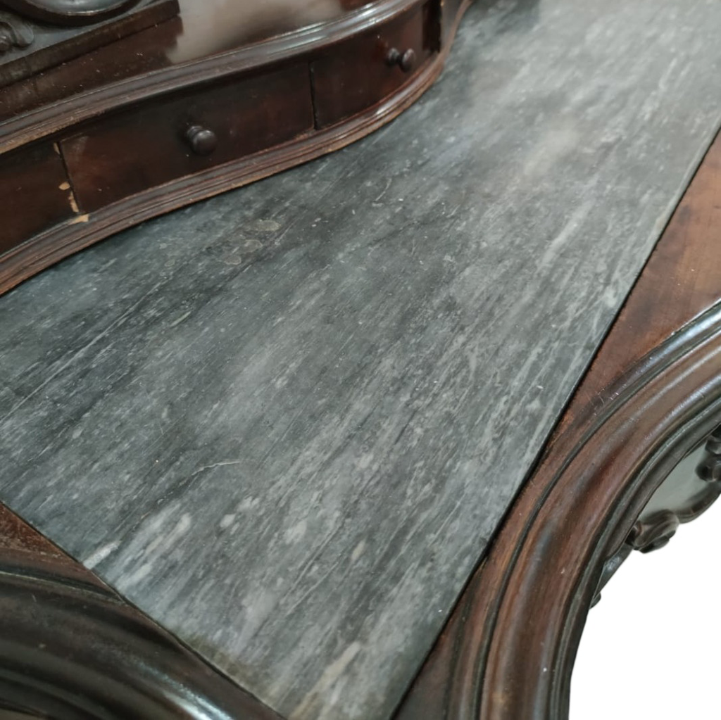 Original detail of the inset top and small drawers, showing surface wear