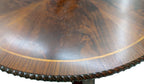 Original detail of the flame mahogany tabletop, inlaid border and carved edge