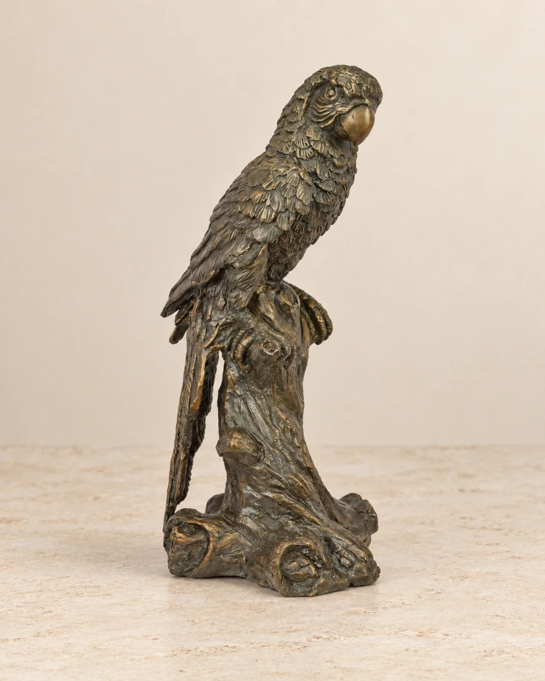 Macaw Bronze Sculpture — primary view against a warm ivory background