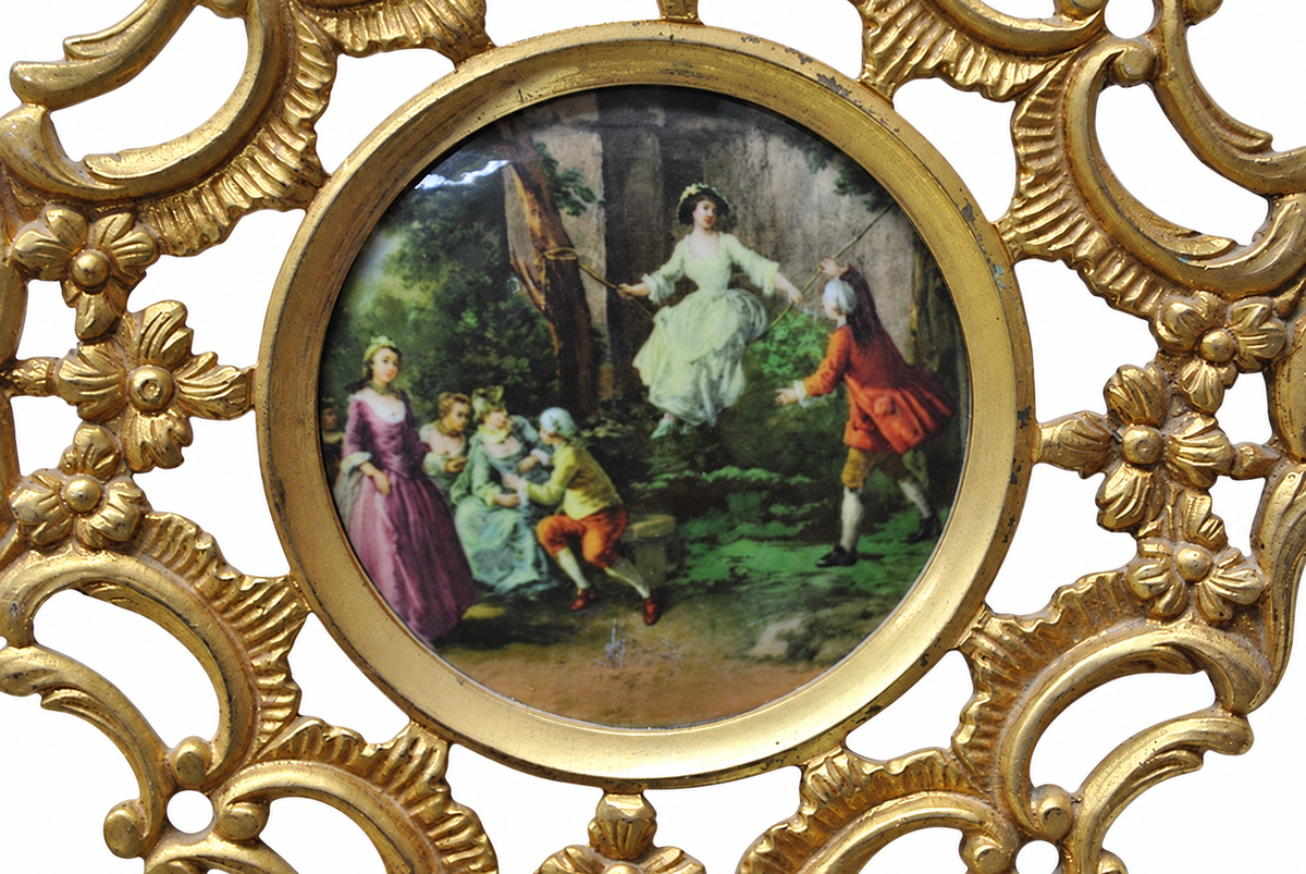 Gilt-Bronze Wall Plaque with Porcelain Figural Medallion — detail on white background