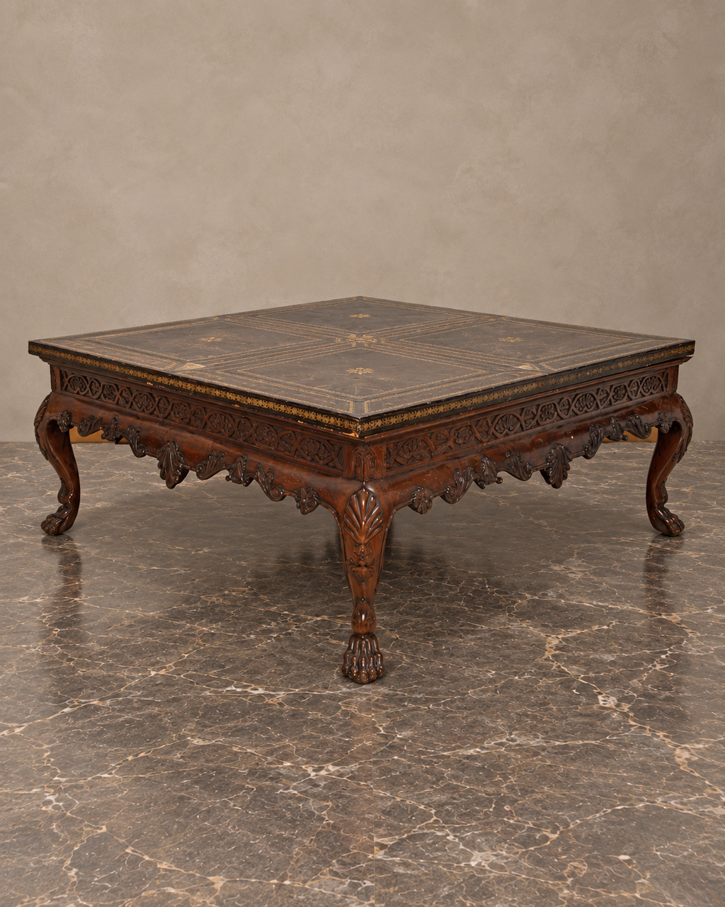 Carved Mahogany Coffee Table with Gilt-Tooled Leather Top — main view