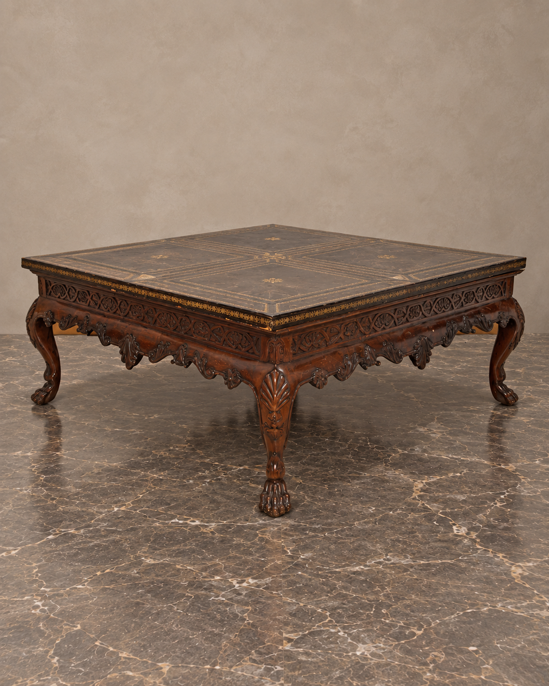 Carved Mahogany Coffee Table with Gilt-Tooled Leather Top — main view