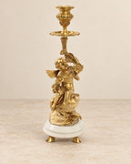 Pair of Cherub Bronze Candlesticks with Marble Bases — primary view