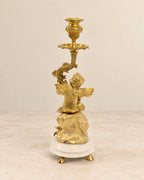 Pair of Cherub Bronze Candlesticks with Marble Bases — reverse view