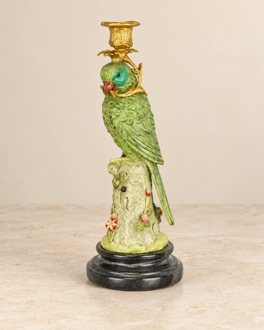 Parrot Bronze Candle Holder — primary view against a warm ivory background
