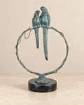 Parrots on a Branch Bronze Sculpture — primary view against a warm ivory background