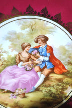 Burgundy and Gilt Porcelain Plate with Romantic Scene — detail view 4