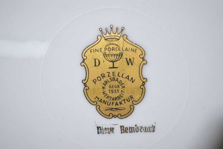 Burgundy and Gilt Porcelain Plate with Romantic Scene — detail view 8