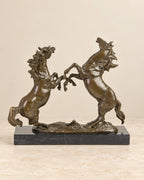 Rearing Horses Bronze Sculpture — second view against a warm ivory background