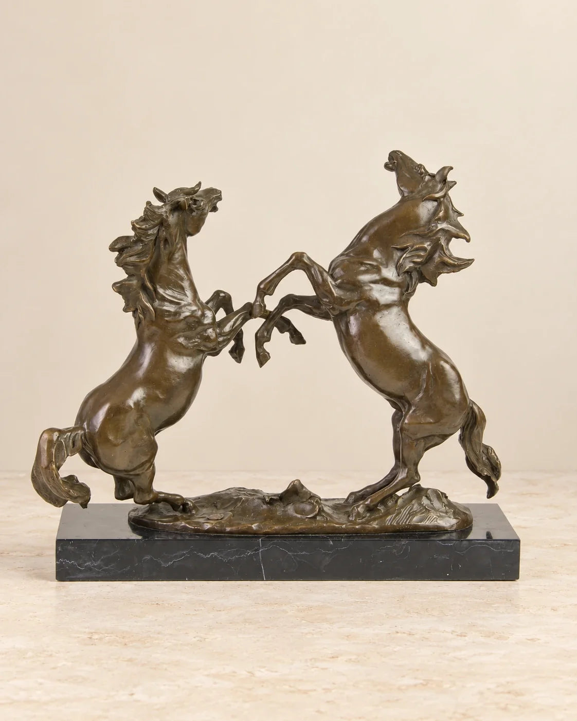 Rearing Horses Bronze Sculpture — second view against a warm ivory background