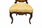 Set of Six Isabelino-Style Mahogany Chairs with Yellow Damask — detail on white background