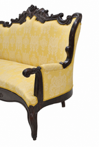 Carved Isabelino-Style Mahogany Sofa with Yellow Silk Damask — detail on white background