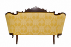 Carved Isabelino-Style Mahogany Sofa with Yellow Silk Damask — detail on white background