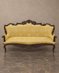 Carved Isabelino-Style Mahogany Sofa with Yellow Silk Damask — main view