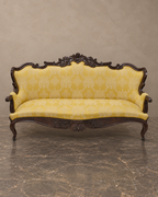Carved Isabelino-Style Mahogany Sofa with Yellow Silk Damask — main view
